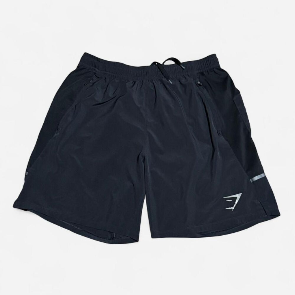 Gymshark black medium size (width 13in, length 17in) shorts with zip up pockets